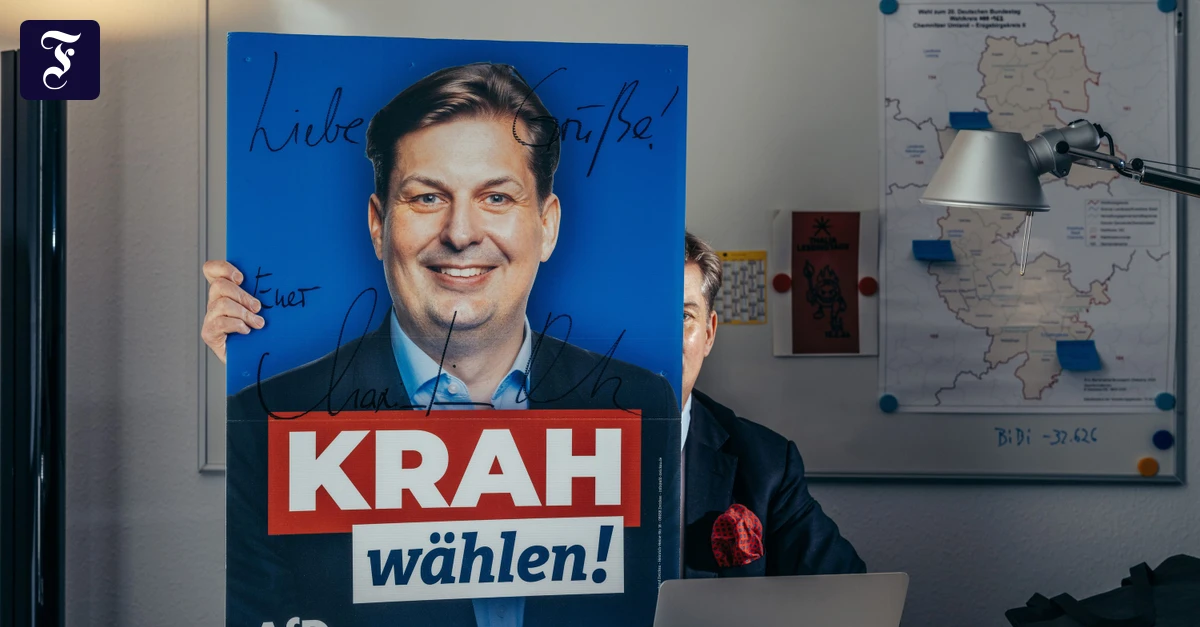 afd-politiker-krah-mit-plakat.webp.webp