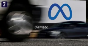 file-photo-cars-drive-past-a.webp.webp
