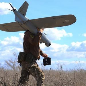 ukrainian-soldier-with-a-drone-72179747899383227a509ade8cc2b1f1.jpeg