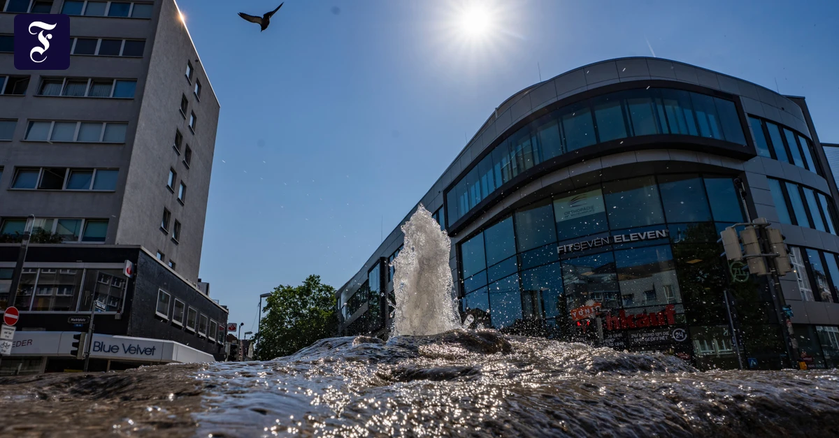 ein-brunnen-sprudelt-auf-dem.webp.webp