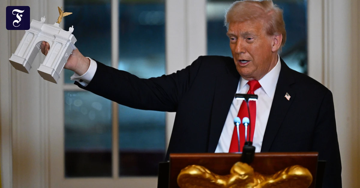 donald-trump-zeigt-ein-modell.webp.webp