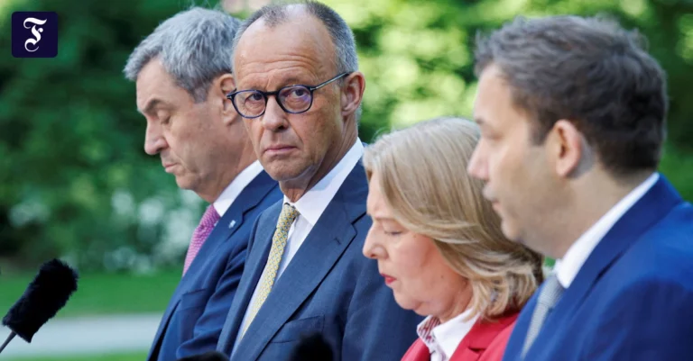 friedrich-merz-zwischen-markus.webp.webp